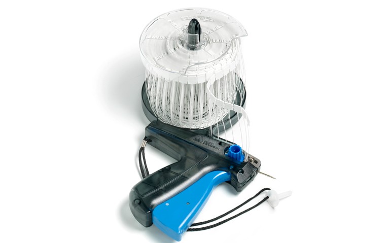 Blue Graphic System 1000 Hand Tool loaded with Graphic Fasteners Reel